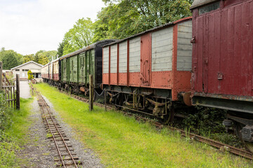 collection of old abandoned wooden train carriage's decay and rust