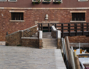 Fototapeta na wymiar Architectural detail of an old bridge in Venice, Italy 