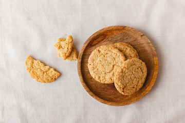 Oatmeal cookies on a wooden plate