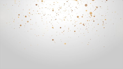 Golden shiny sparkling particles on light grey background