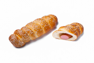 Bun with sausage and sesame seeds