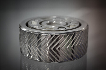 Object printed on metal 3d printer close-up. Object printed in laser sintering machine. Modern 3D printer printing from metal powder. Concept progressive additive DMLS, SLM, SLS