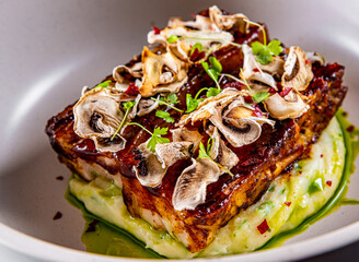 pork brisket and mashed potato on white plate.