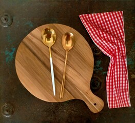 table setting with spoon, fork and napkin