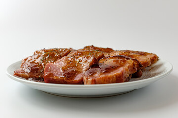 smoked pork belly on a white background
