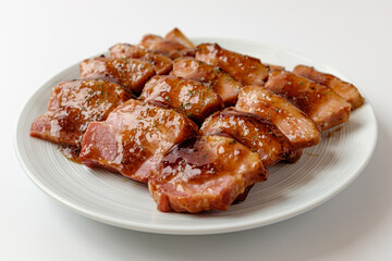 smoked pork belly on a white background