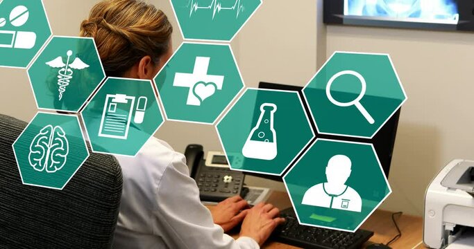 Animation of scientific icons in hexagons over caucasian female lab worker using computer