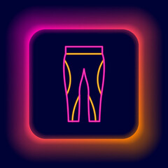 Glowing neon line Leggings icon isolated on black background. Colorful outline concept. Vector
