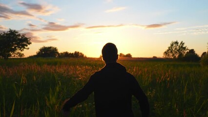 Trying to move on from the miseries of life taking a walk in the fields 