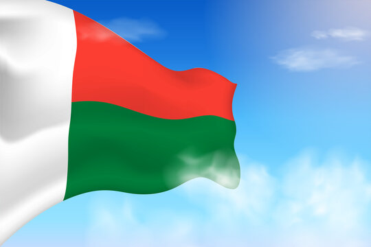Madagascar flag in the clouds. Vector flag waving in the sky. National day realistic flag illustration. Blue sky vector.