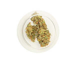 Dry cannabis buds flowers in a glass jar on a white background