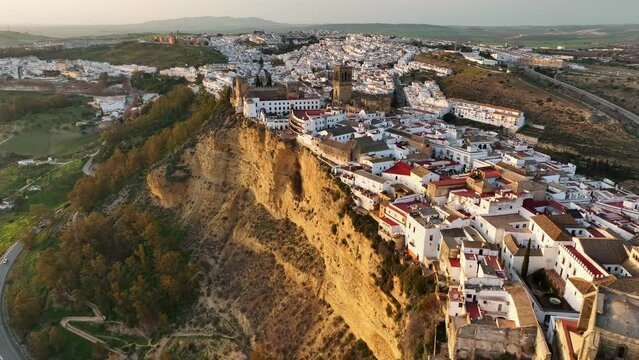 Arcos de la Frontera, Andalusia, Spain at sunset. Aerial shot one of famous pueblos blancos in Andalusia - Arcos de la Frontera