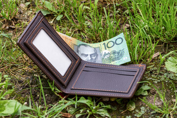 Lost Wallet with Australian dollar  money on a grass