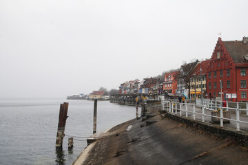 Naklejka premium The embankment and harbor in Meersburg, Germany