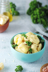 A bowl with Italian dumplings - tortellini