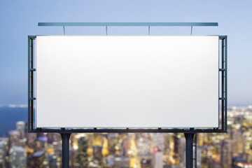 Blank white horizontal billboard on cityscape background at night, front view. Mockup, advertising...