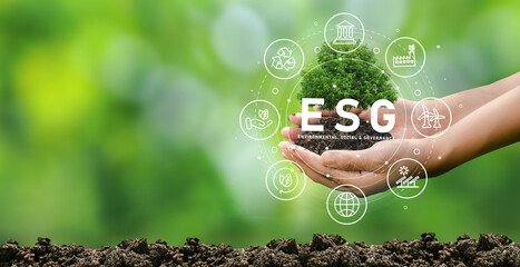 Hand planting trees with hands ESG icon concept for environmental, social and governance in...