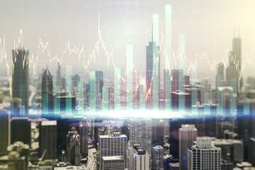 Multi exposure of virtual creative financial chart hologram on Chicago skyscrapers background, research and analytics concept