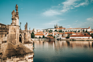 Prague, Czech republic. Beautiful view to Vltava river. Charles bridge - Karluv Most and medieval gothic architecture on opposite coast.