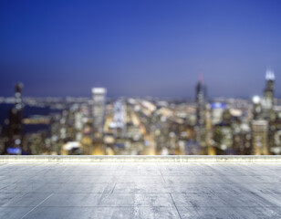 Empty concrete dirty rooftop on the background of a beautiful blurry Chicago city skyline at night, mockup