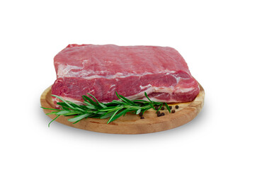 Pork meat with rosemary on a wooden plate, isolated on a white background