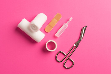 First aid kit, Medical bandages with scissors and sticking plaster. Medical equipment.