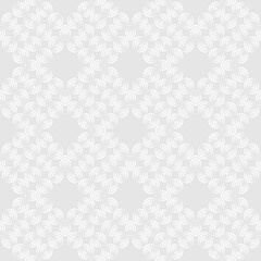 Delicate pattern of white swirls on a pale gray background in vector. Seamless print for fabric, bed linen.
