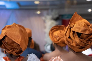 Fototapeten Nigerian american woman gele headtie at wedding © primestockphotograpy