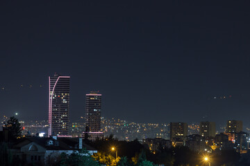 Bursa city night view with modern skyscrapers and buildings. Landscape with night lghts.