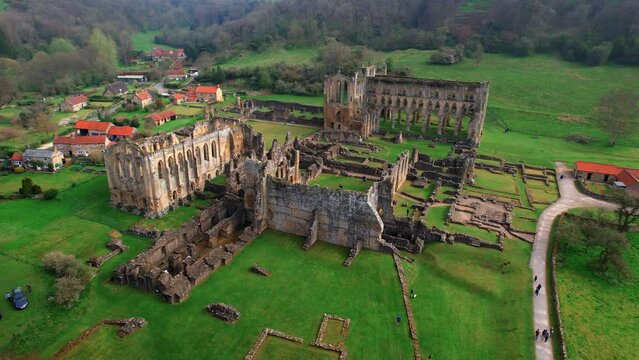 Extensive Ruins Of Rievaulx Abbey Near Helmsley In The North York Moors National Park, North Yorkshire, England. Aerial Drone Shot