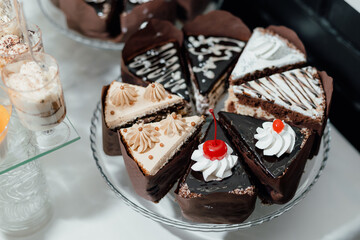 chocolate cake on a plate with a fork