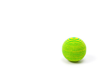 Green pinstriped plastic ball with soft fabric cover for playing with pets.