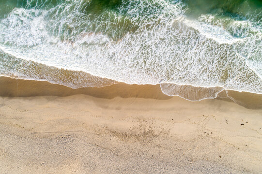 Summer aerial photo of beach with ocean and free space for your decoration.
