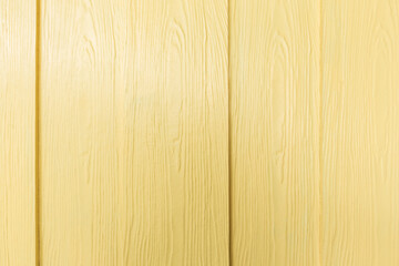 The light yellow wall wooden texture for a designer background.