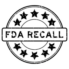 Grunge black FDA recall word with star icon round rubber seal stamp on white background