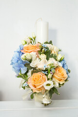 Godfather's candle embellished  with bohemian flower bouquet, prepared for orthodox marriage...