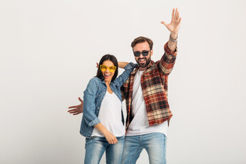 stylish man and woman in casual denim hipster outfit having fun