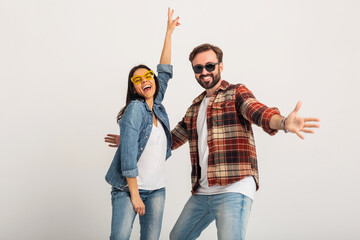 Obraz premium stylish man and woman in casual denim hipster outfit having fun