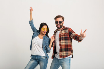 stylish man and woman in casual denim hipster outfit having fun