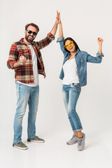 stylish man and woman in casual denim hipster outfit having fun