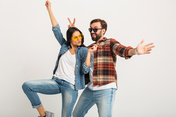 stylish man and woman in casual denim hipster outfit having fun