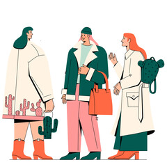 Fashionable young women talking to each other