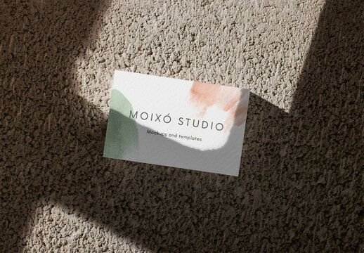 Business Card Stack Mockup on a Concrete Floor with Shadow