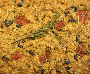 Homemade bread with rosemary, dried olives and tomatoes