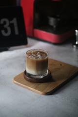 Close-up of coffee and potted plants on the table