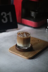Close-up of coffee and potted plants on the table