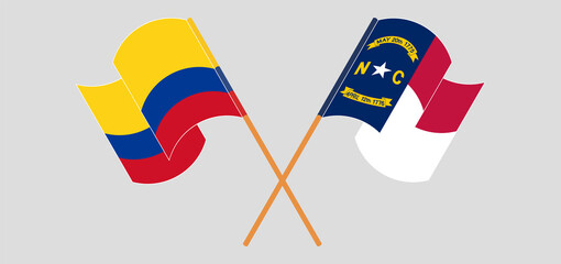 Crossed flags of Colombia and The State of North Carolina. Official colors. Correct proportion