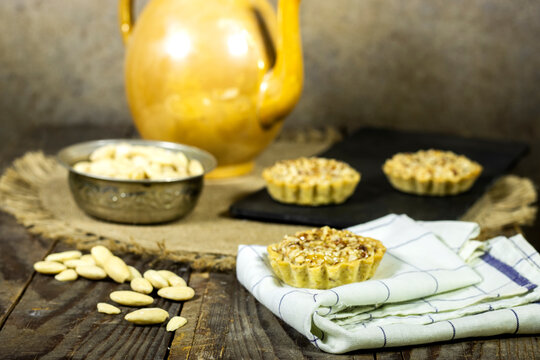 delicious homemade almond pie or tartlet on black plate