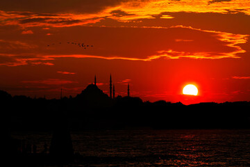 Sunset in Istanbul, Turkey with Suleymaniye Mosque (Ottoman imperial mosque). View from Galata...