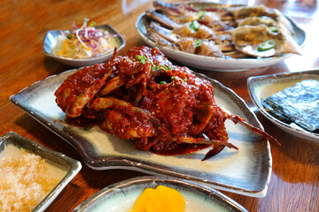 Spicy Marinated Crab is a spicy Korean dish made from fresh crab and seasoned with various seasonings including red pepper powder.
